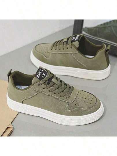 zielone sznurowane buty