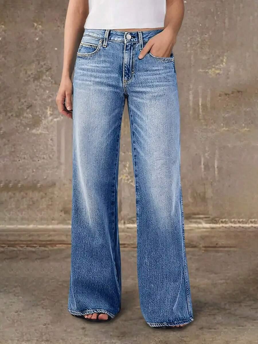 niebieskie spodnie jeans 