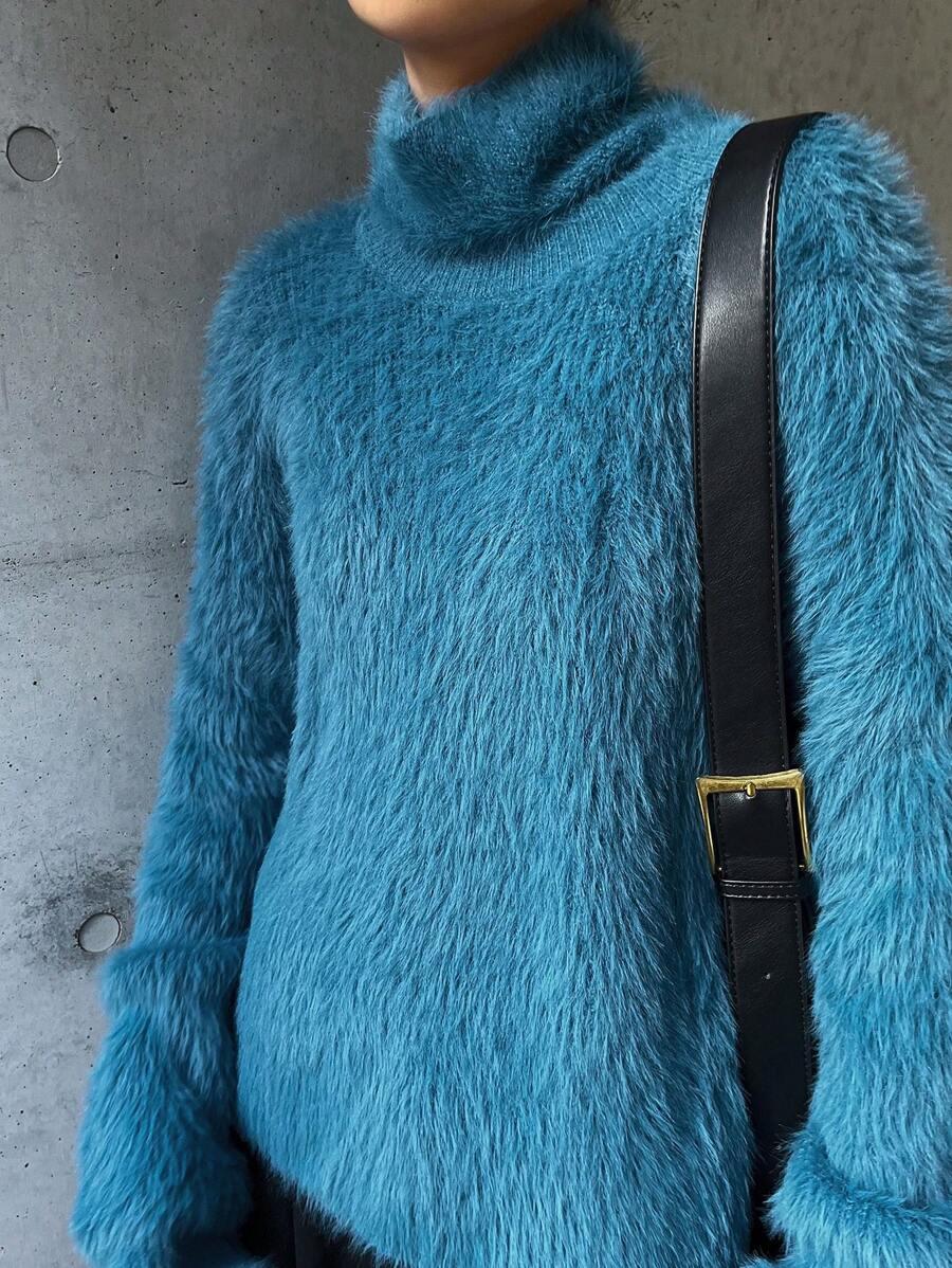 niebieski sweter miś