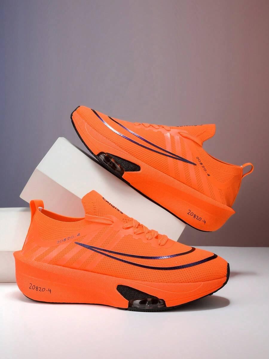 pomarańczowe buty sportowe