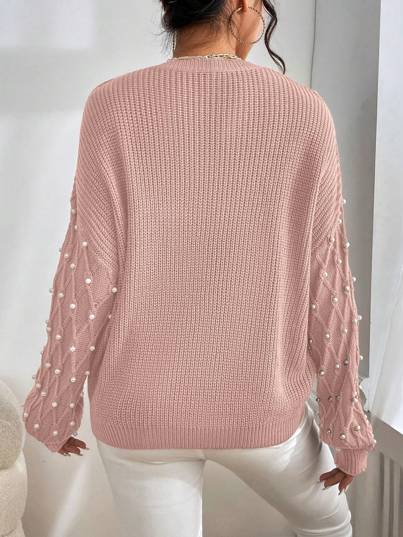 różowy sweter zdobienie perełki