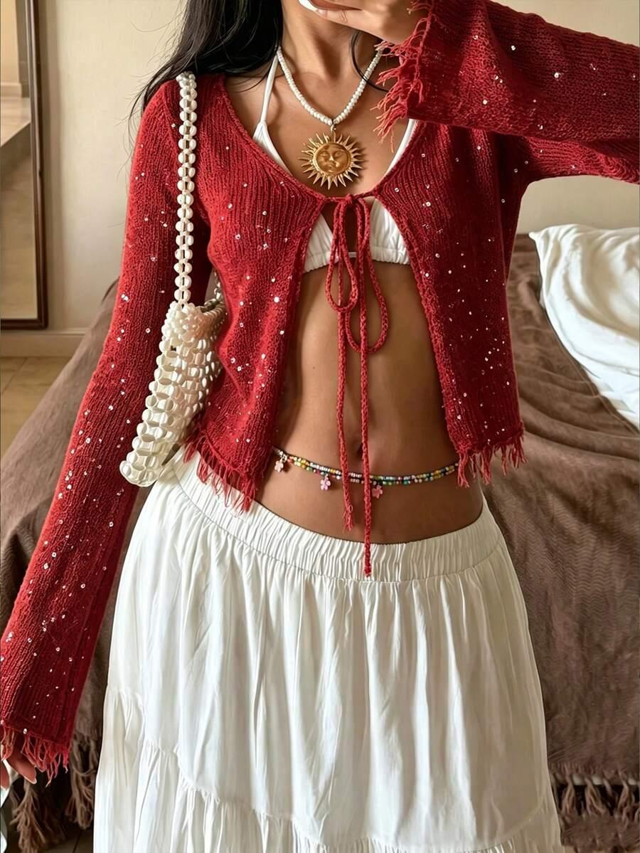 czerwony sweter zdobienia