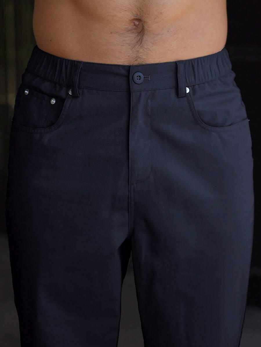 granatowe spodnie casual