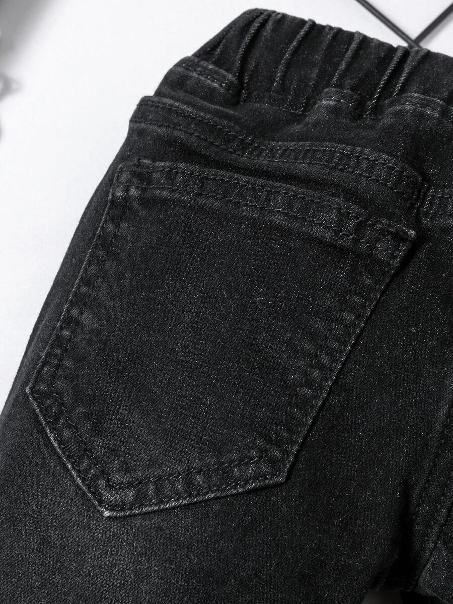 czarne spodnie jeans