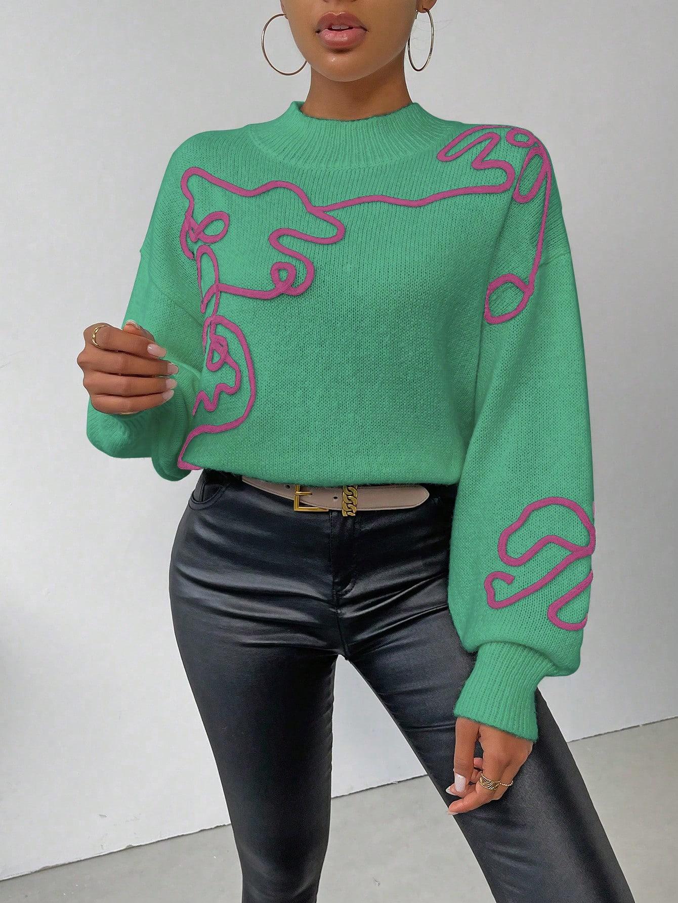 zielony luźny sweter