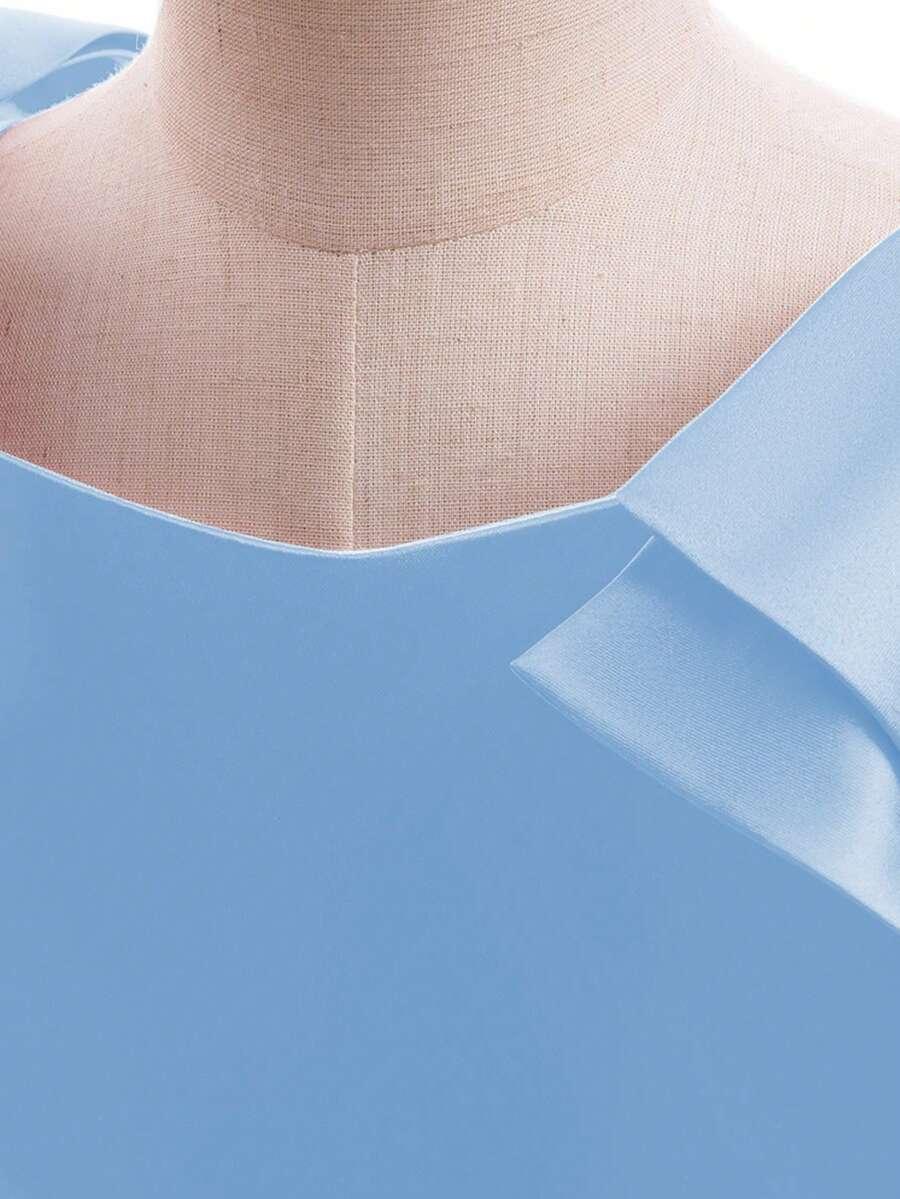 niebieska sukienka kokarda