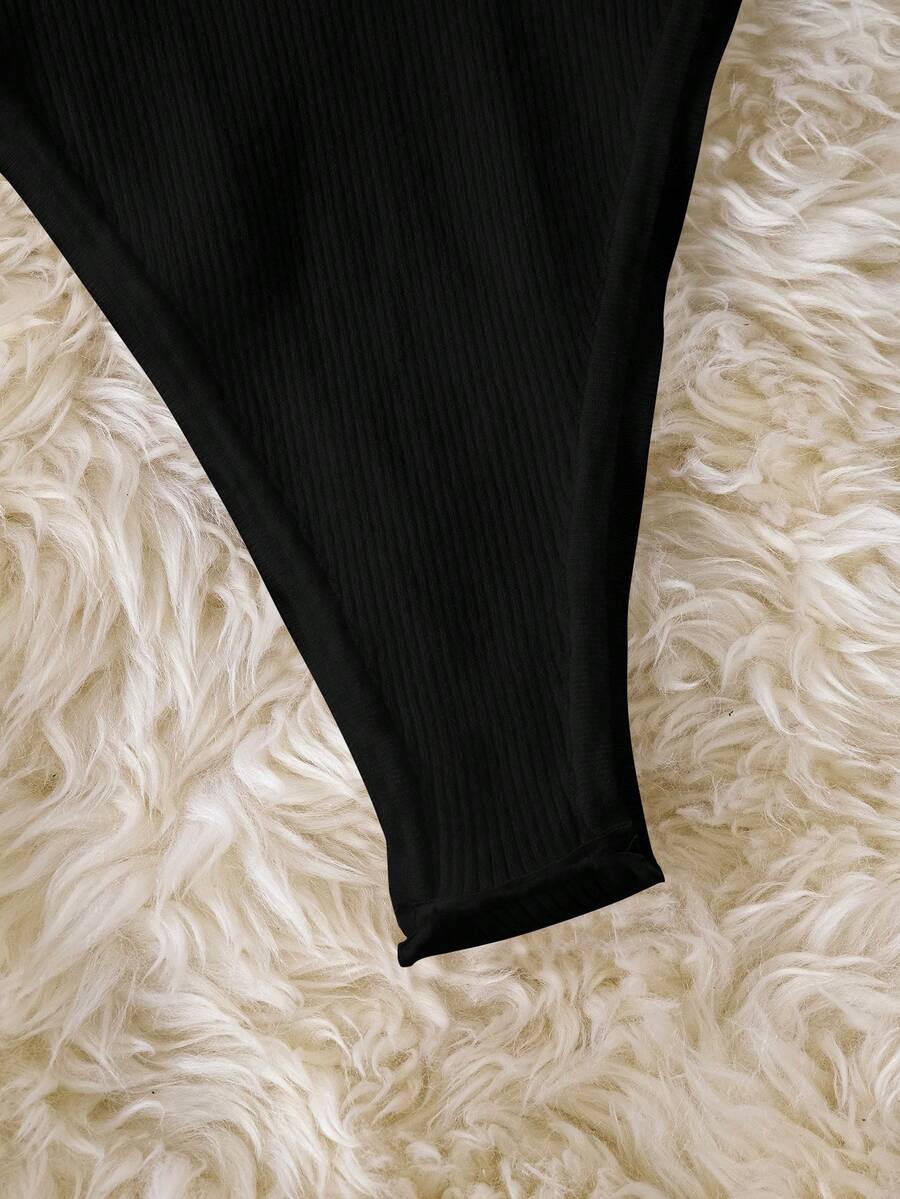 czarne dzianinowe body