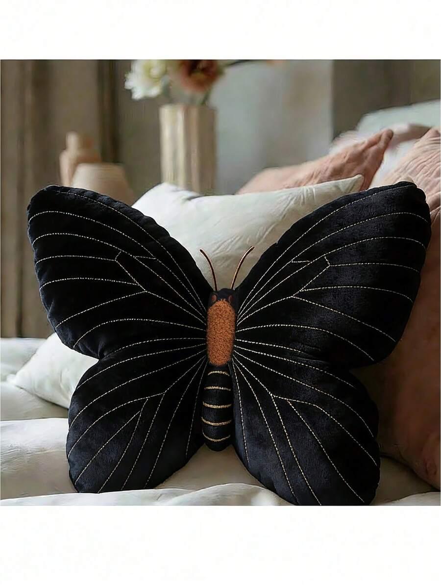czarna poduszka motyl