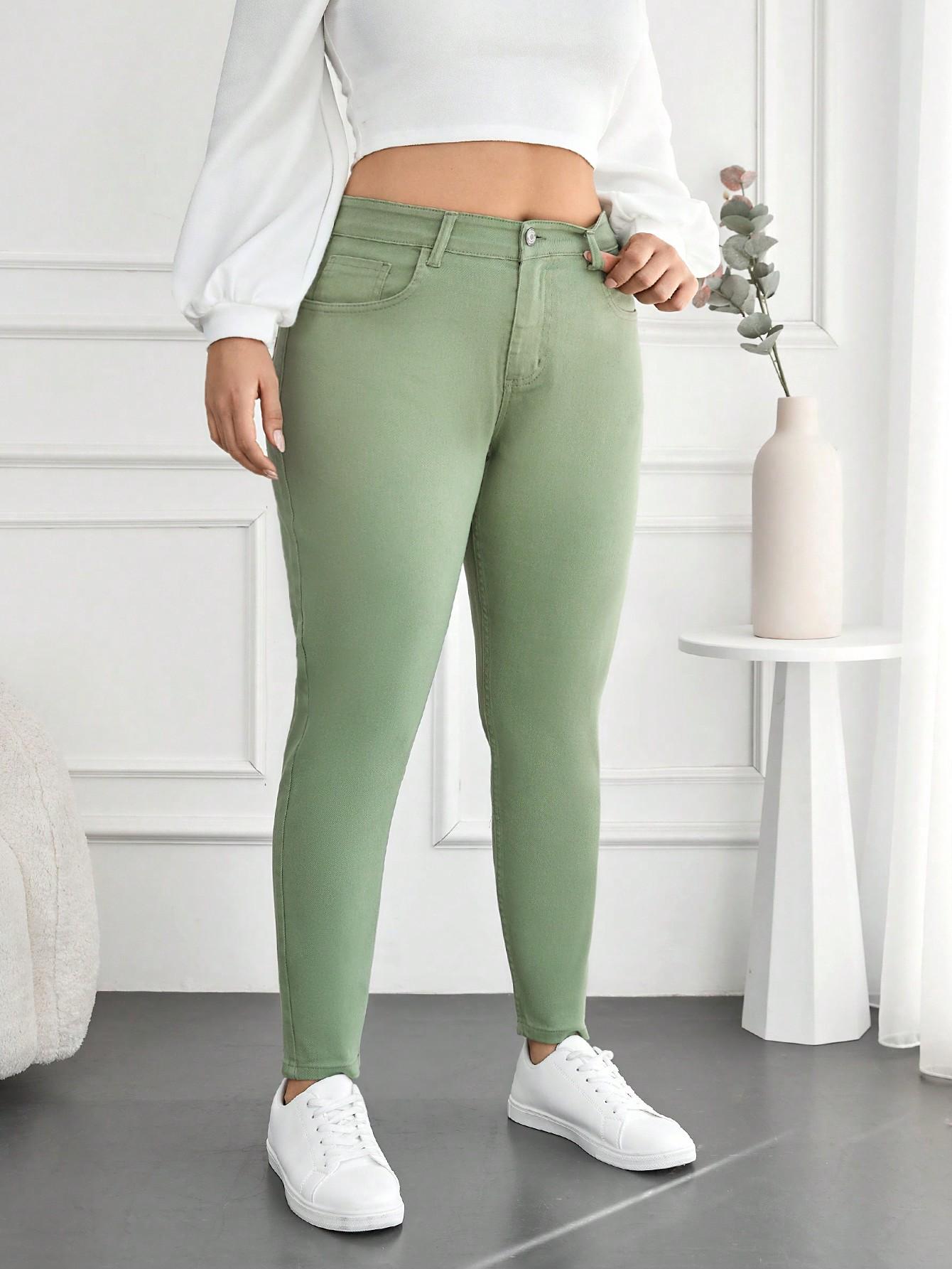 zielone spodnie jeans rurki wysoki stan