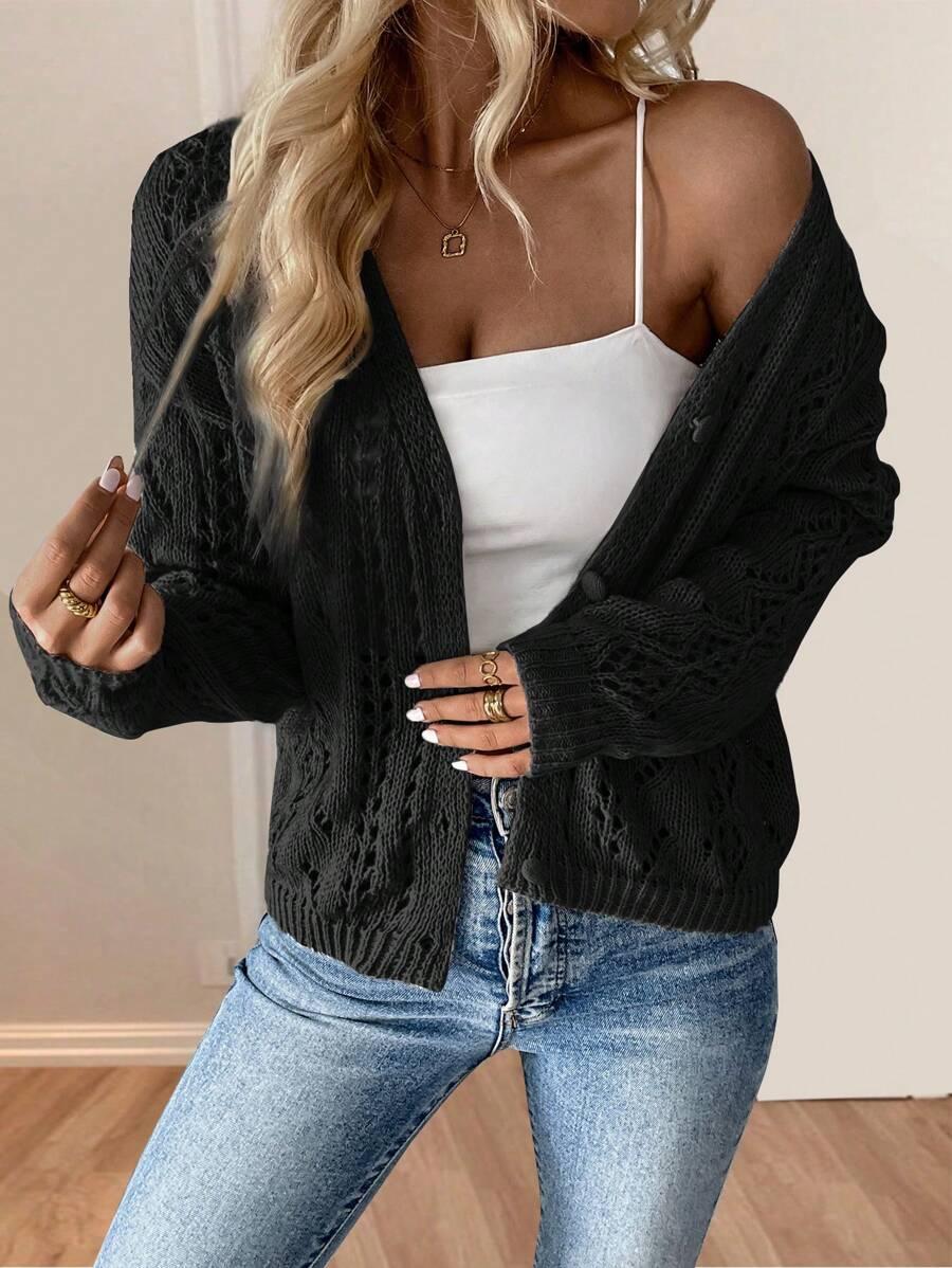 czarny sweter guziki