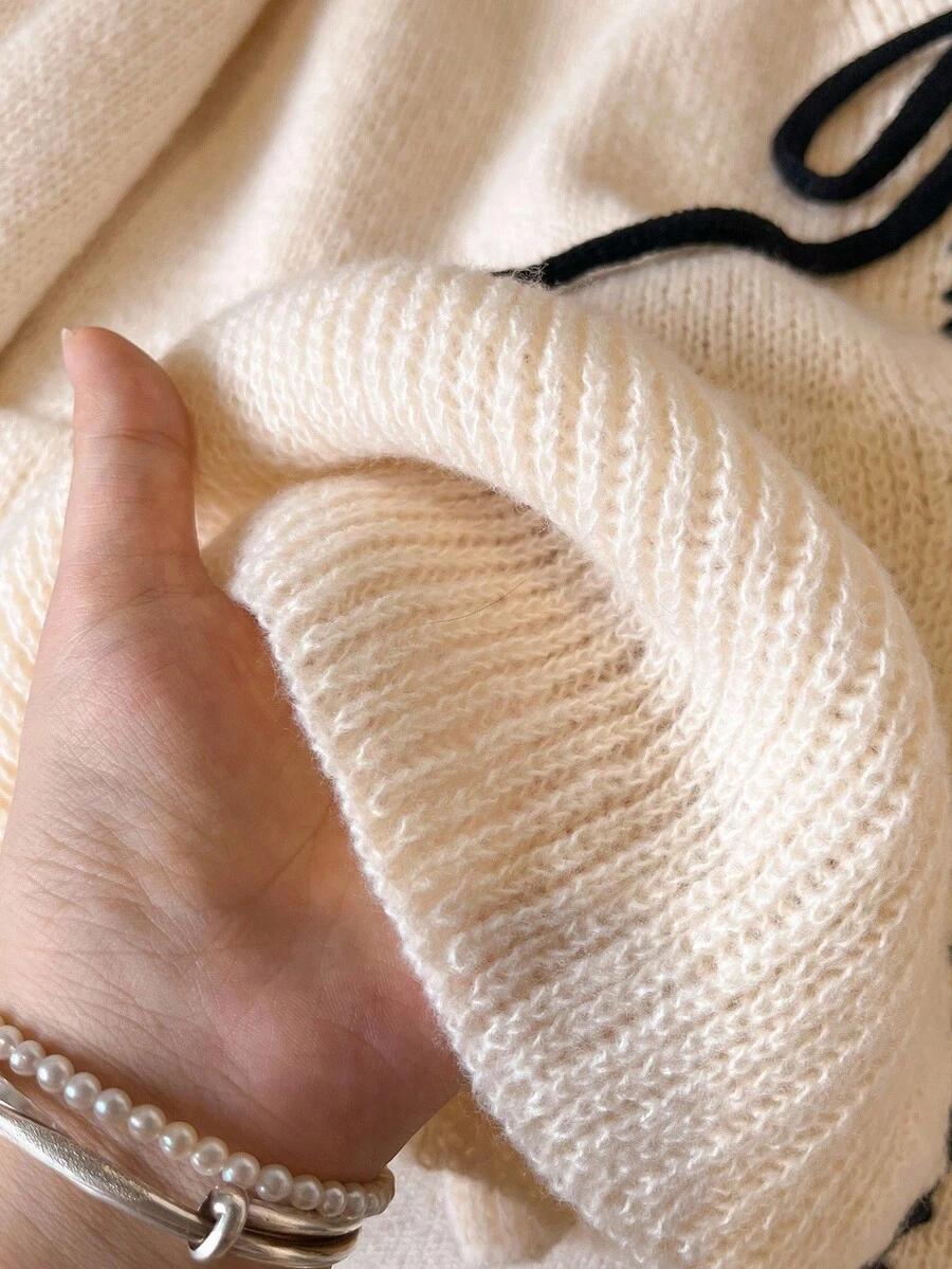 BEŻOWY SWETER WIĄZANIE