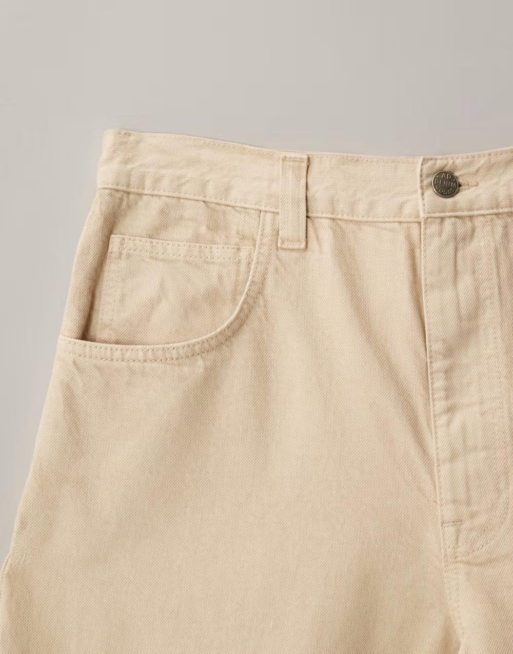 beżowe spodnie jeans zamek