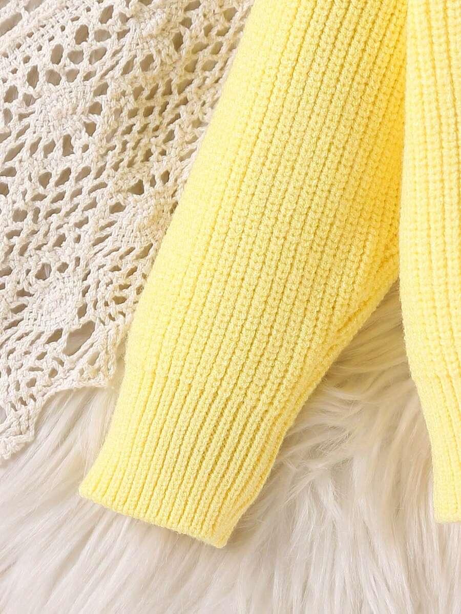 żółty sweter golf