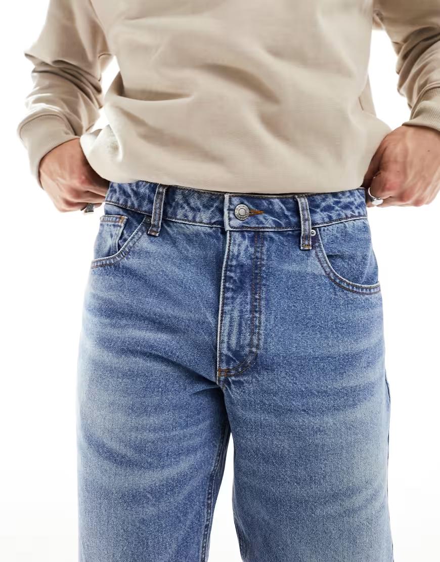 niebieskie spodnie jeans zamek