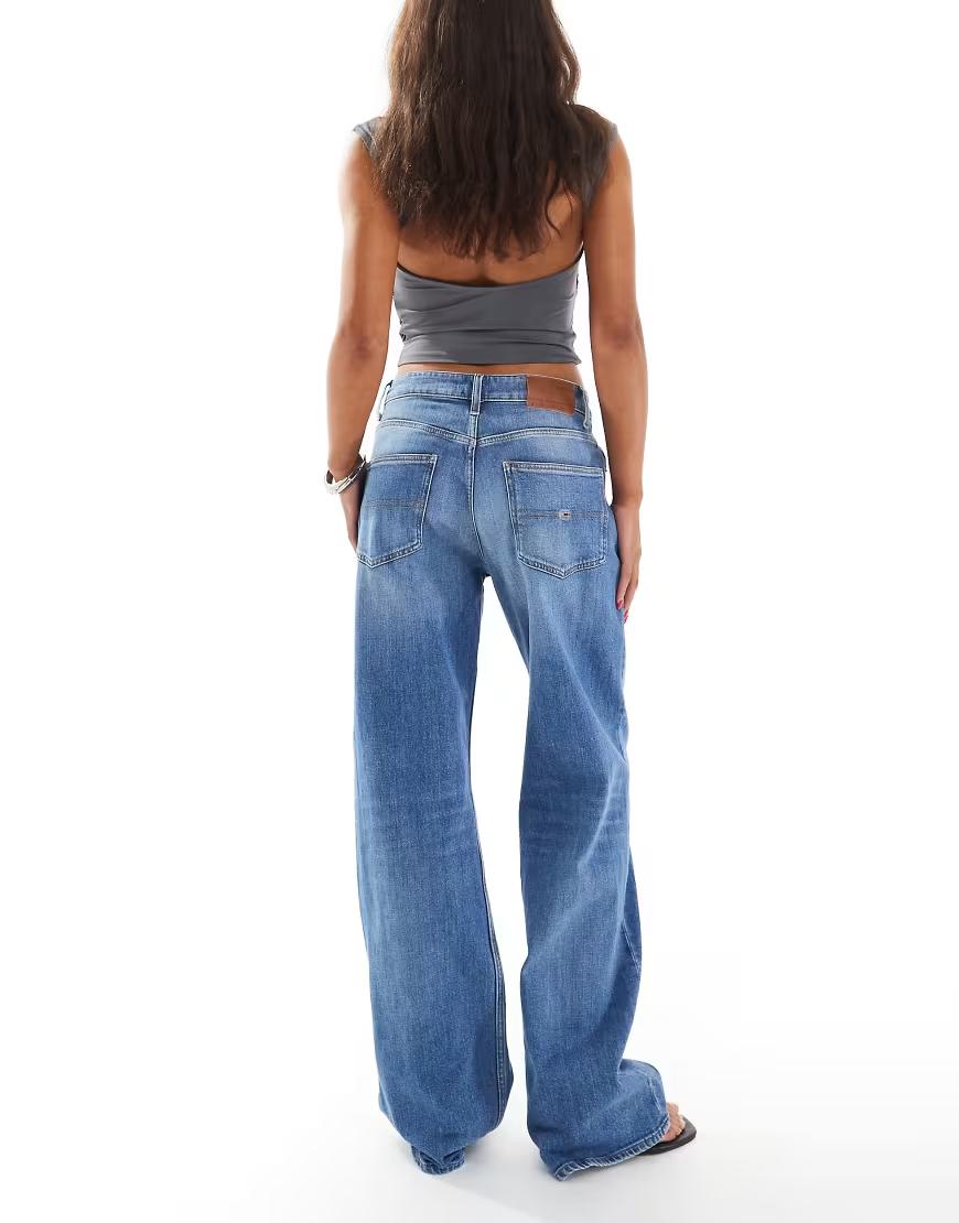 niebieskie spodnie jeans zamek