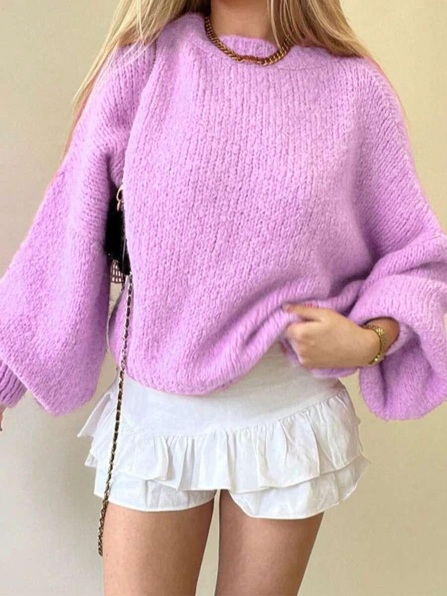 klasyczny luźny różowy sweter