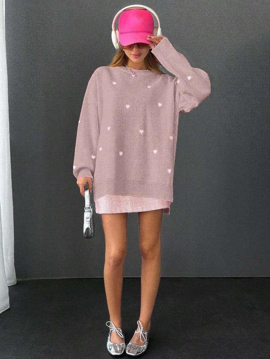różowy sweter wzór serca