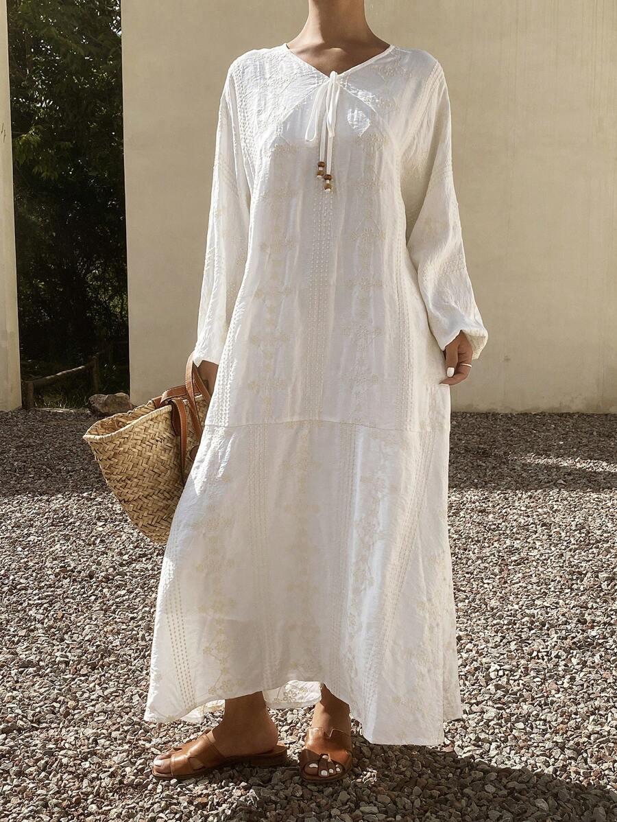 biała sukienka oversize