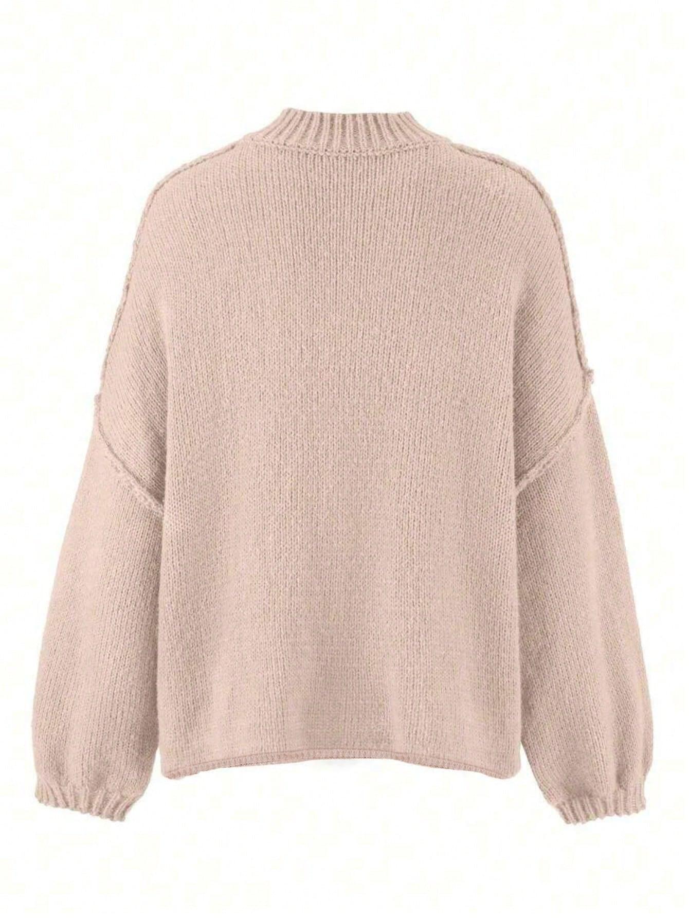 beżowy sweter guziki