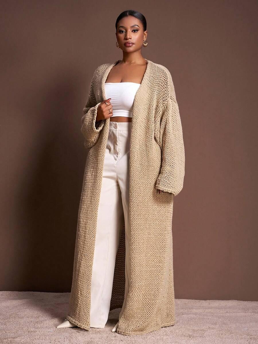 beżowy sweter do kostek