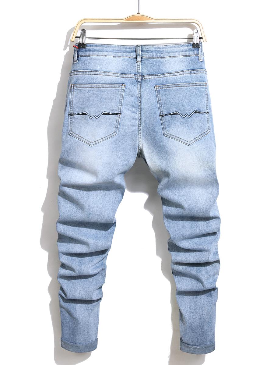 niebieskie spodnie jeans kieszenie zamek