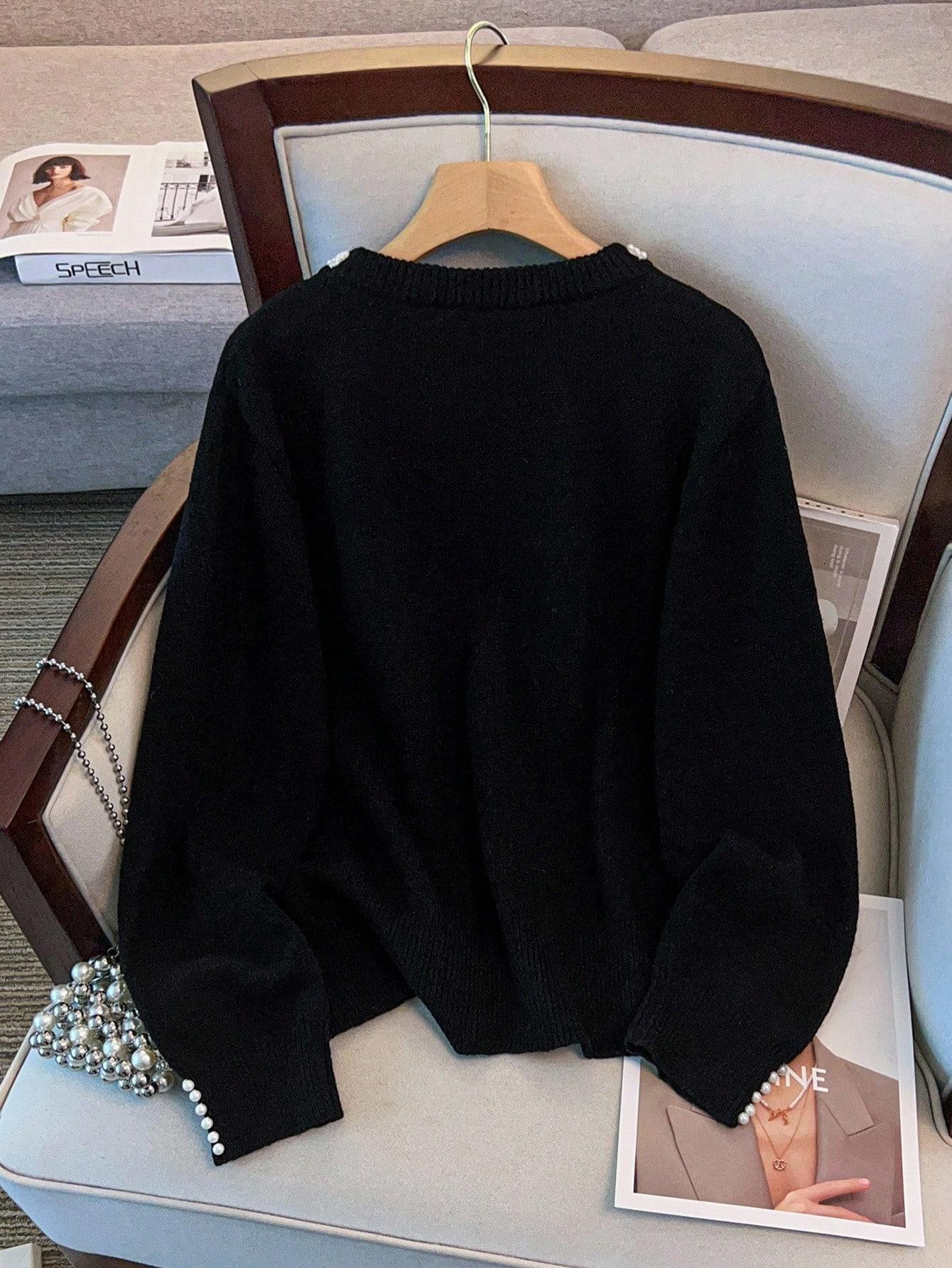 czarny sweter zdobienie 