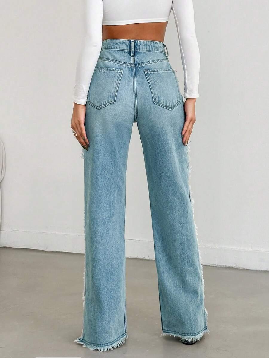 niebieskie spodnie jeans