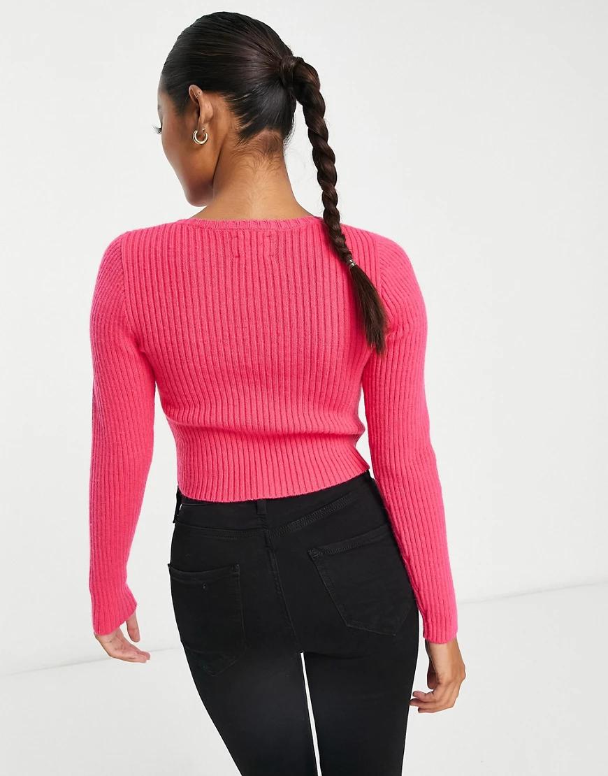 różowy sweter zdobienia frędzle