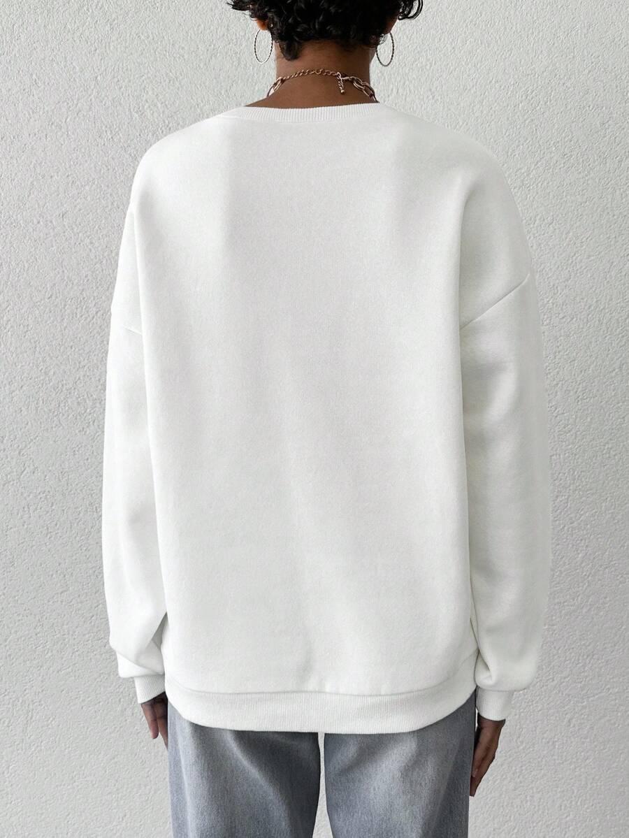 KREMOWA BLUZA NAPISY