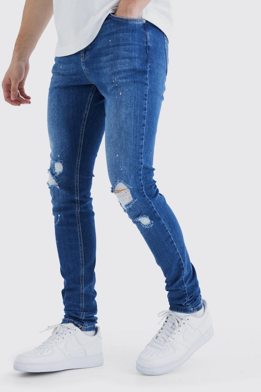 niebieskie spodnie rurki jeans ripped