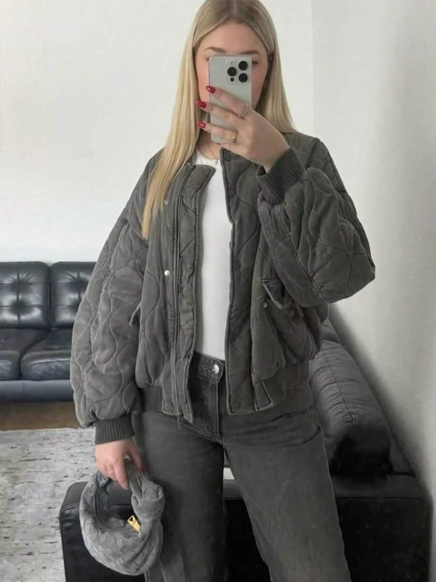 szara kurtka zamek