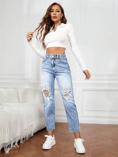 niebieskie spodnie jeans przetarcia