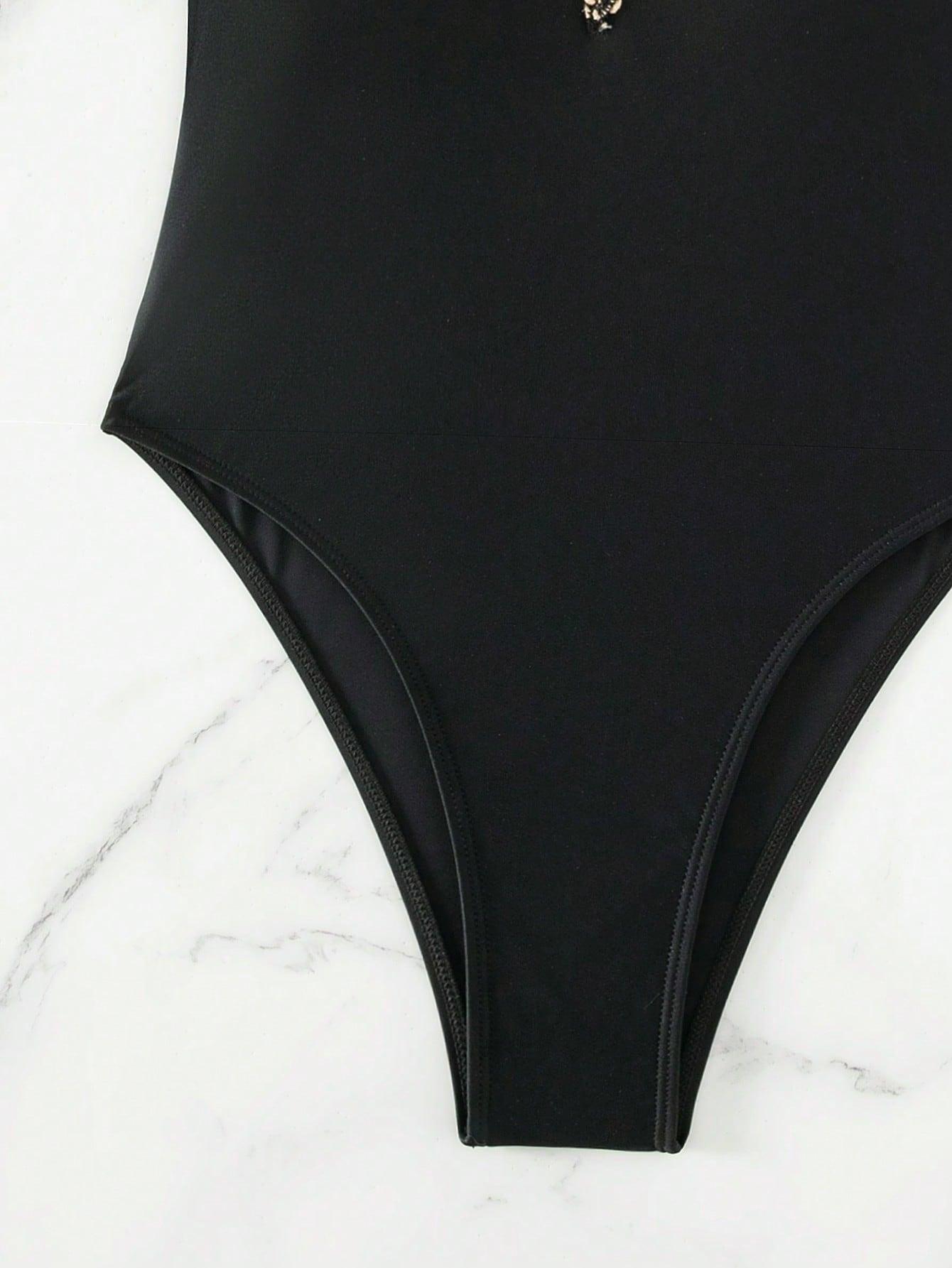 czarny jednoczęściowy strój kąpielowy wstawka cekiny