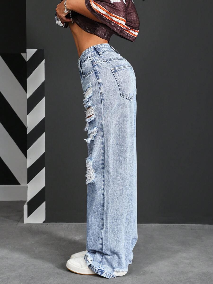 NIEBIESKIE SPODNIE JEANS PRZETARCIA 