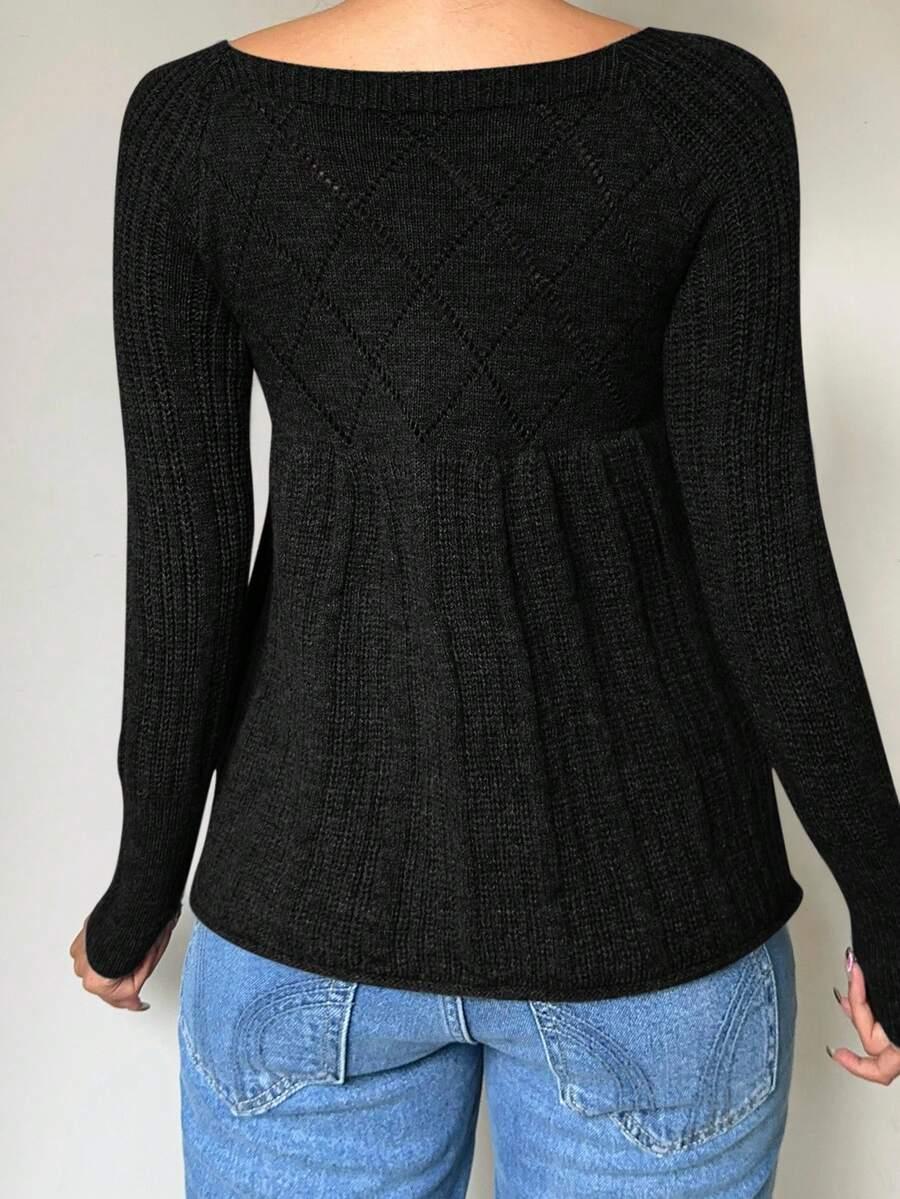 czarny sweter guziki