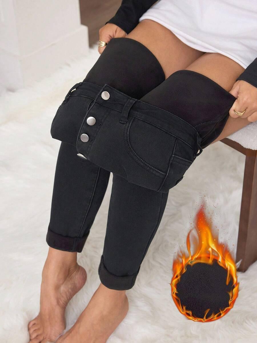 CZARNE OCIEPLANE SPODNIE JEANS RURKI