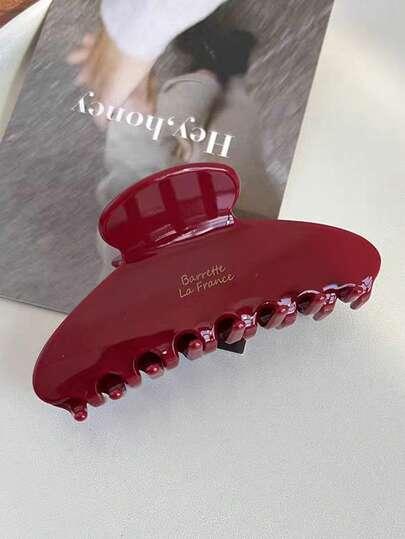 czerwona klamra do włosów