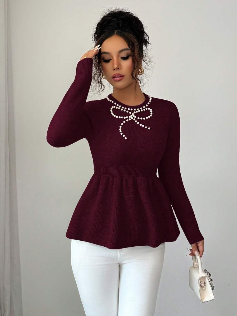 bordowy sweter zdobienie