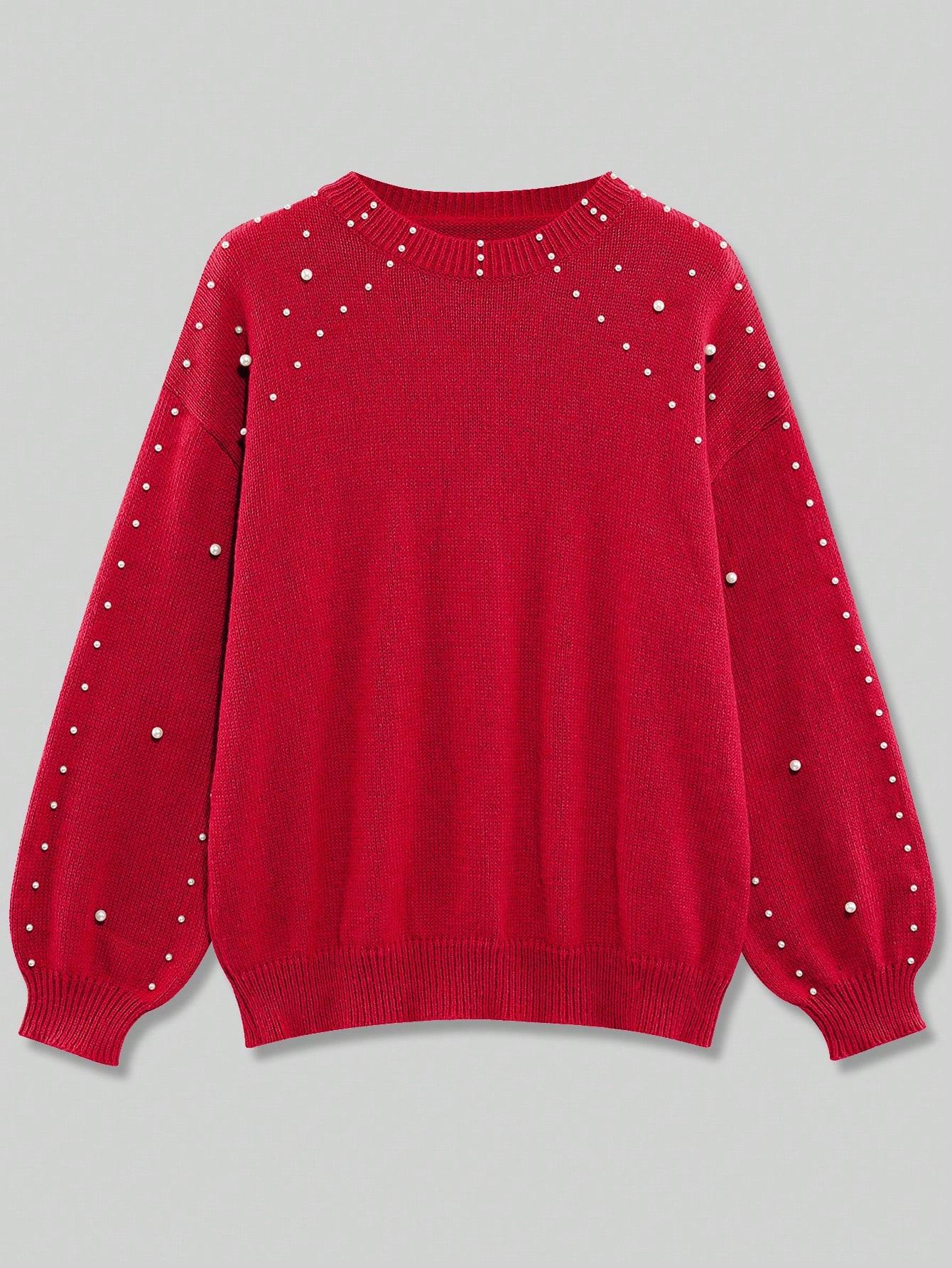 czerwony sweter zdobienie