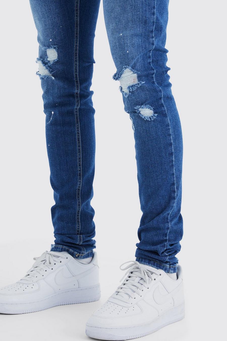 niebieskie spodnie rurki jeans ripped