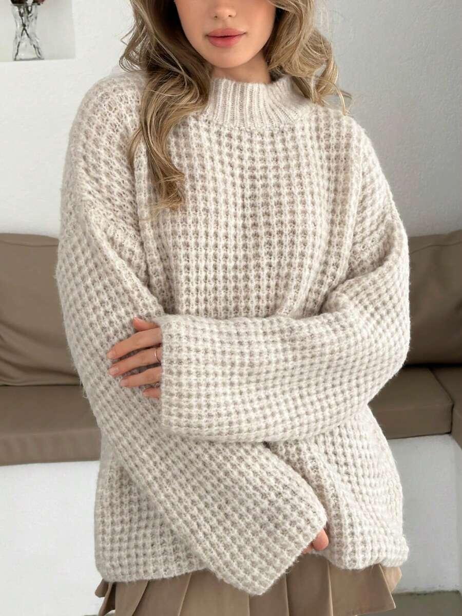 klasyczny beżowy sweter tekstura