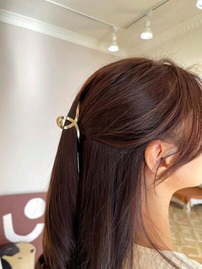 złota klamra do włosów