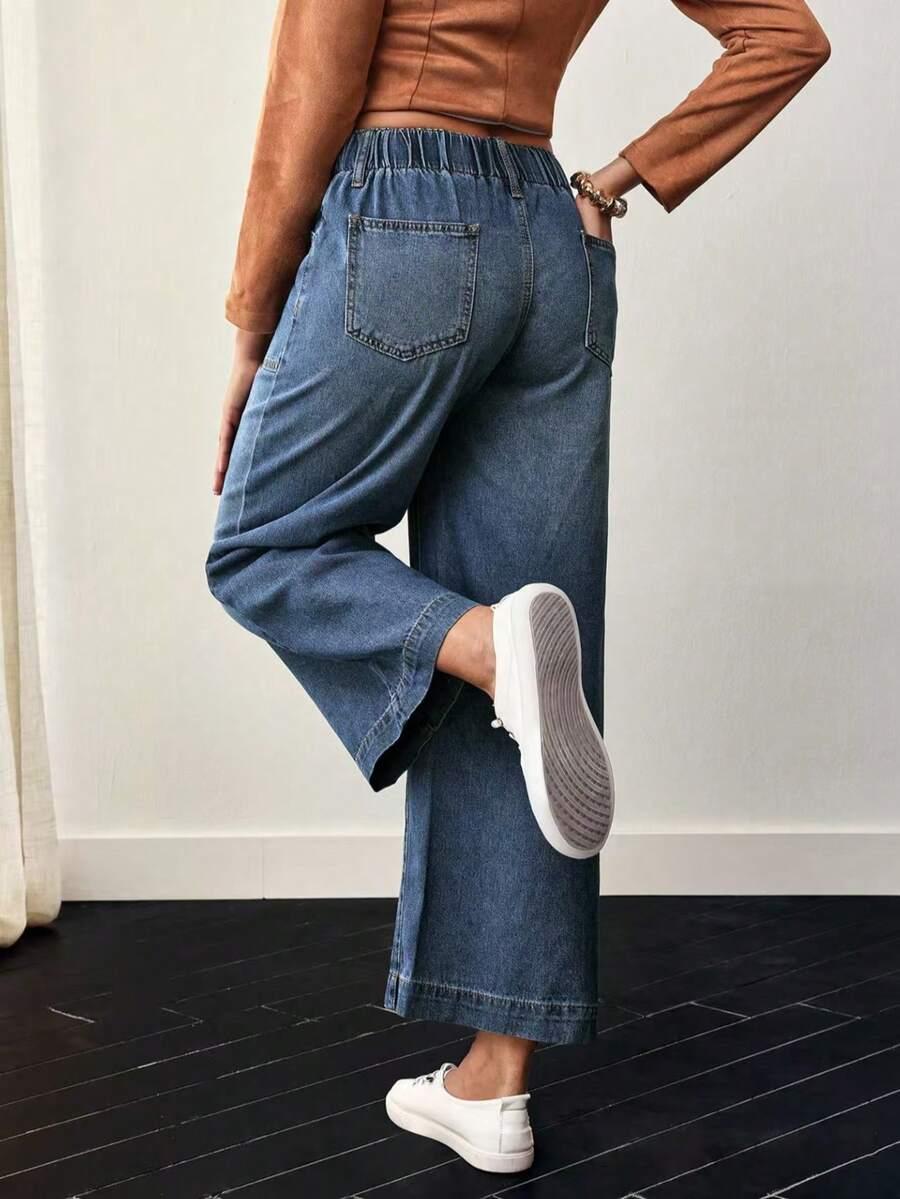 niebieskie spodnie jeans