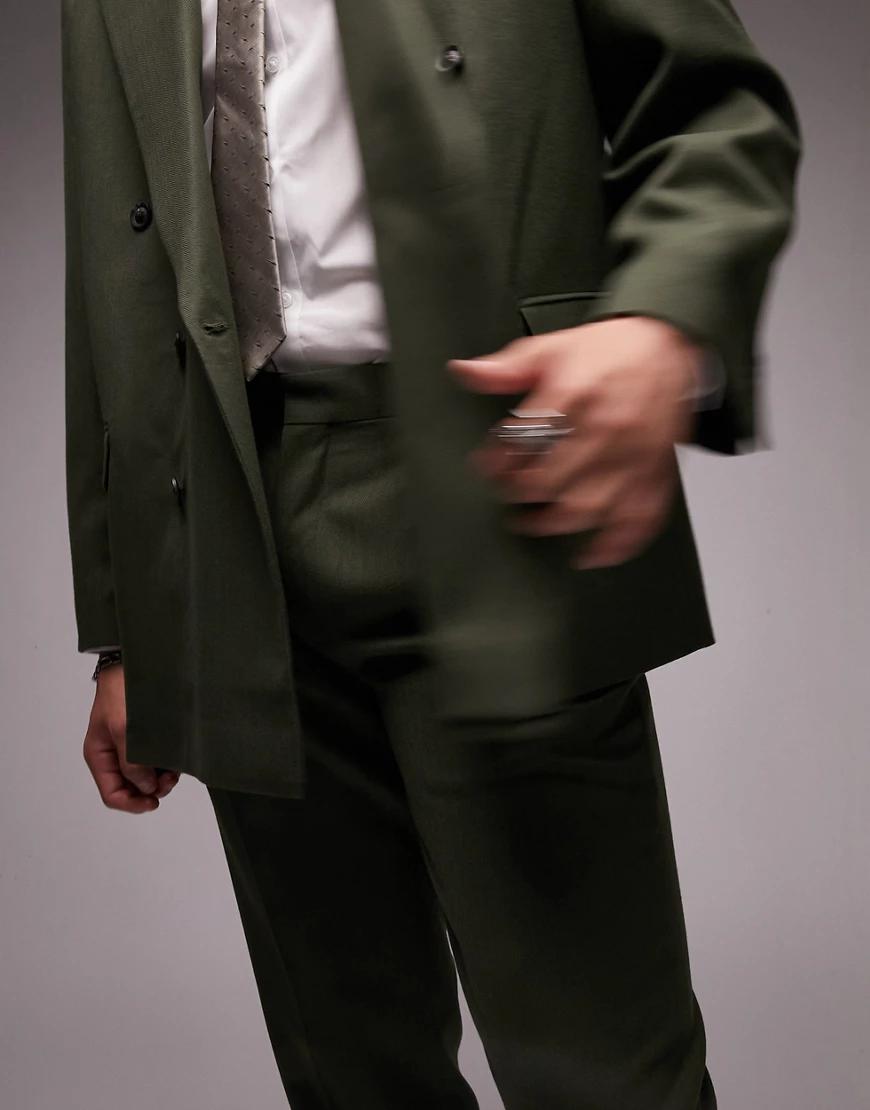 zielone zwężane spodnie w kant