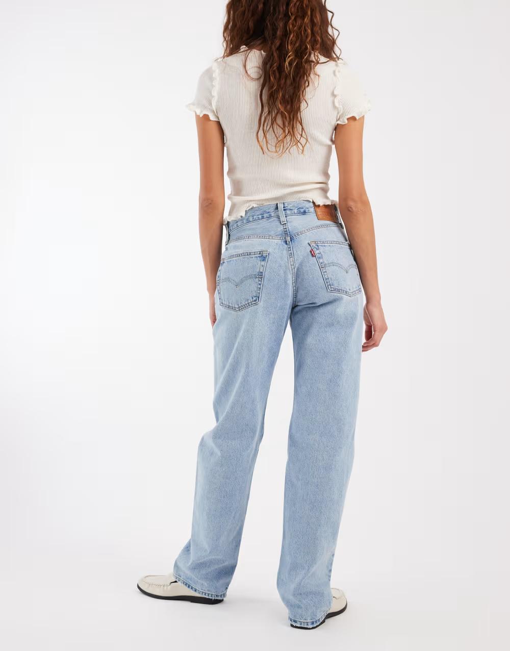niebieskie  spodnie jeans logo