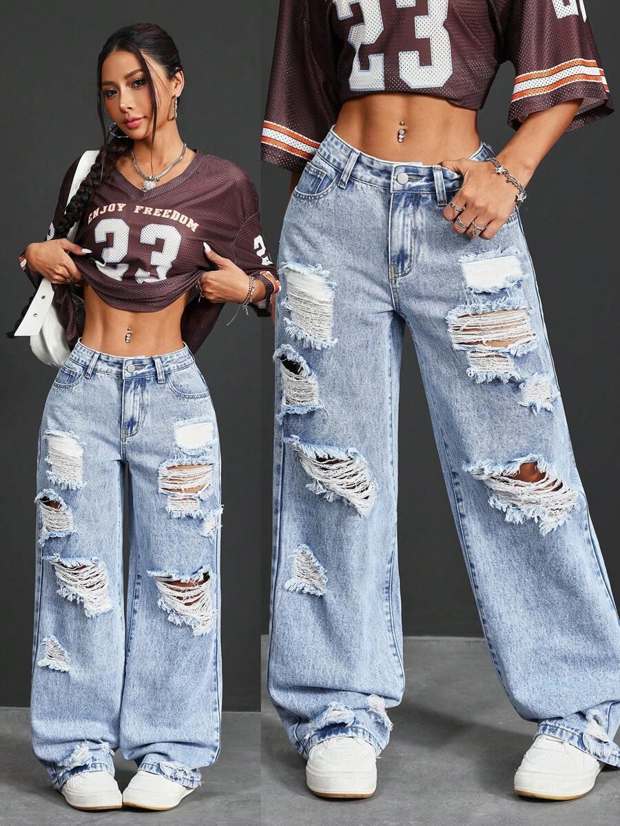 NIEBIESKIE SPODNIE JEANS PRZETARCIA 