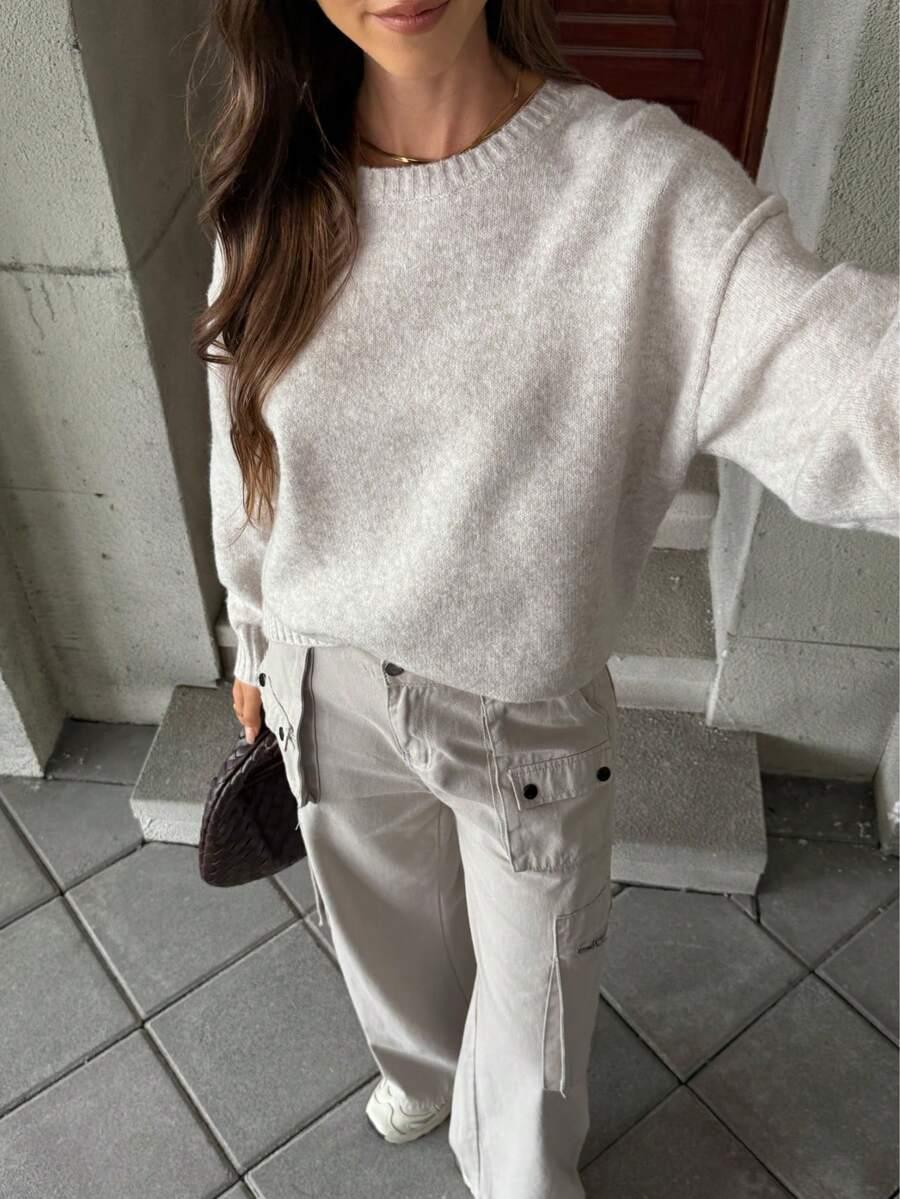 beżowy sweter oversize