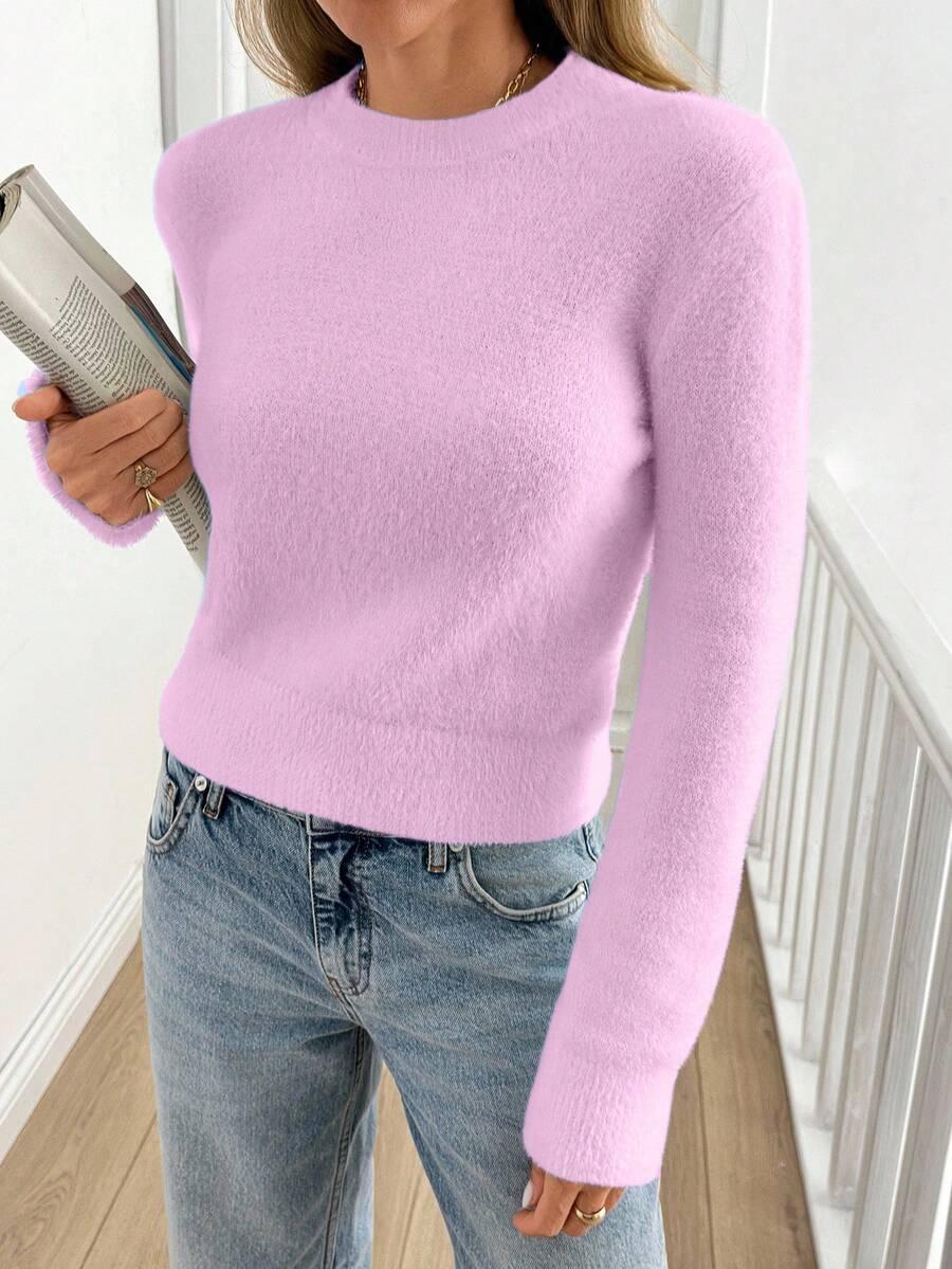 różowy sweter długi rękaw
