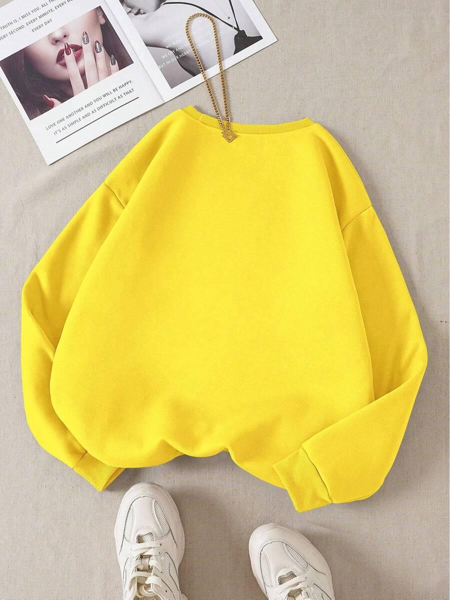żółta gładka bluza z okrągłym dekoltem