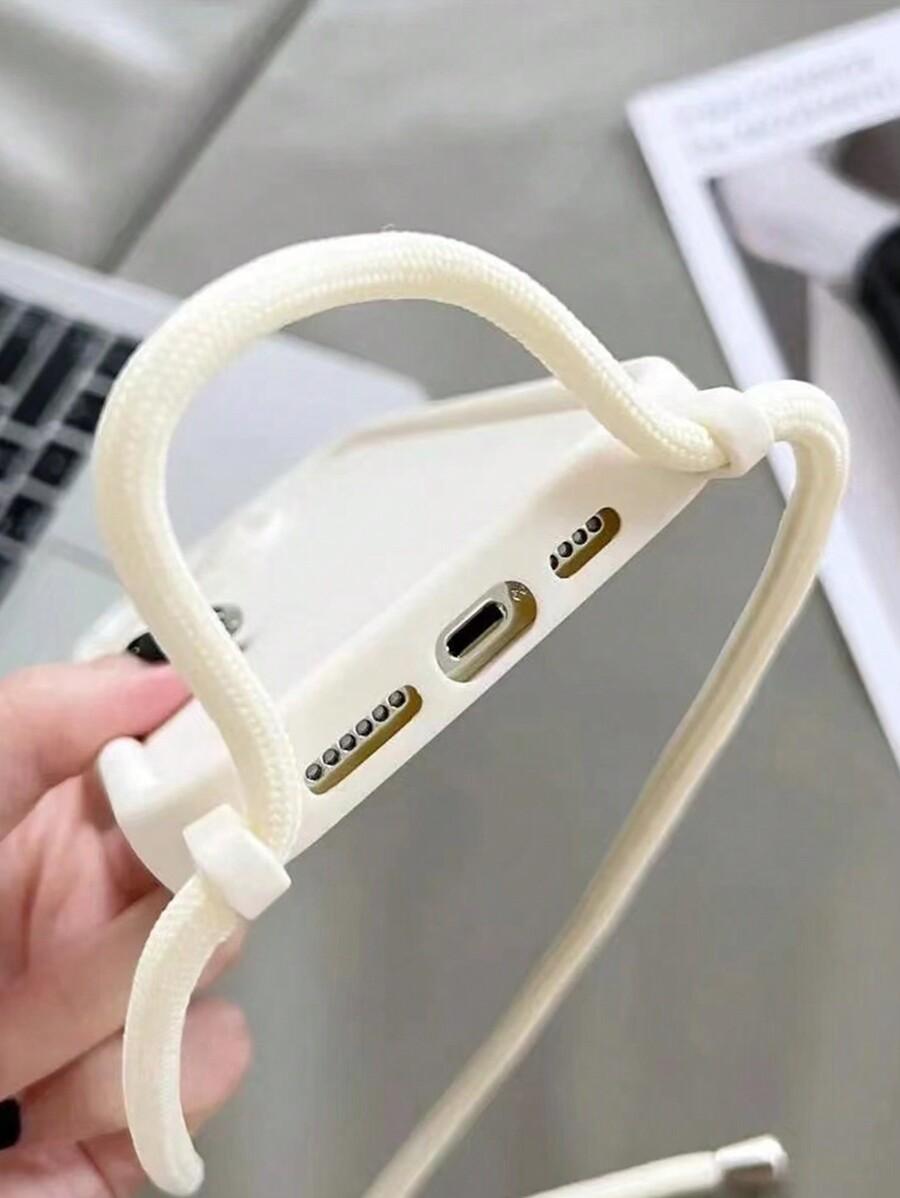 kremowe etui na telefon iPhone 16